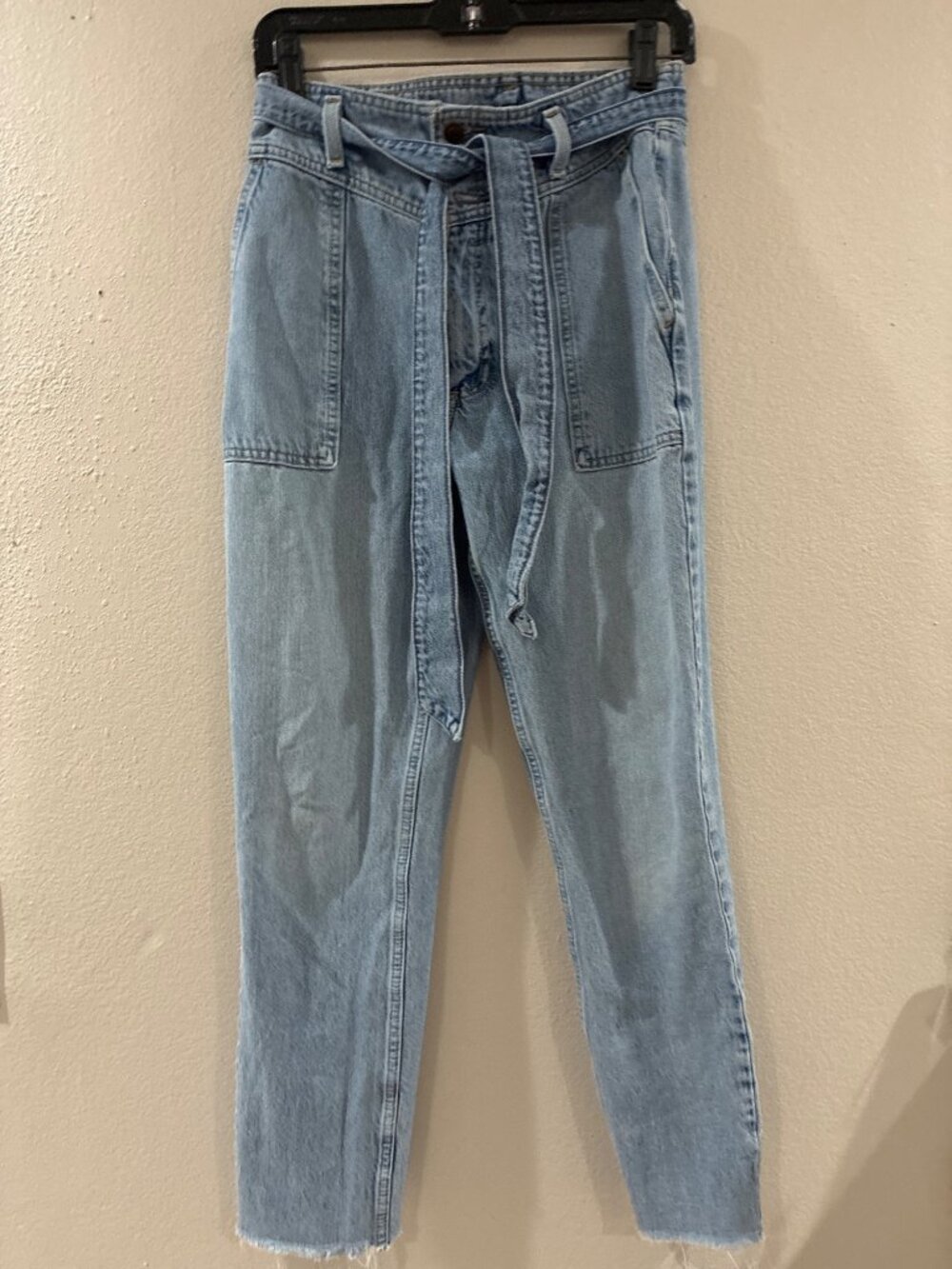 Abercrombie & Fitch Ultra High-Rise Mom Jeans with a matching denim tie belt